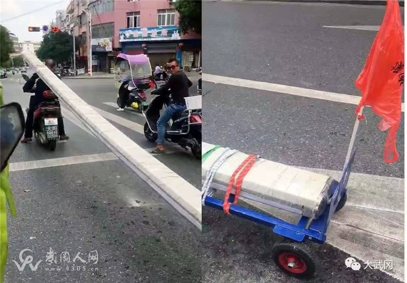 武冈一男子在城区，竟这样骑摩托车，引路人纷纷拍照