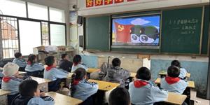 “红小帽”点亮春天——光明小学“3•5”学雷锋在行动